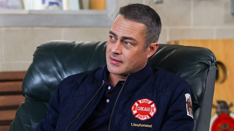 Kelly Severide sitting in chair