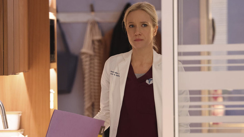 Hannah Asher walks through a sliding door on "Chicago Med"