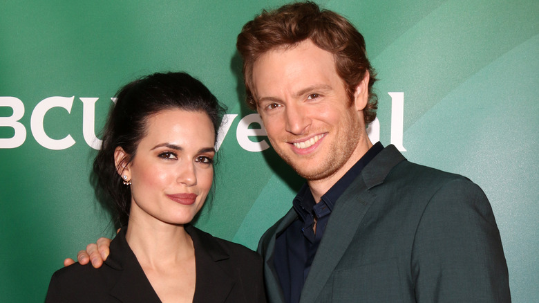 Torrey DeVitto and Nick Gehlfuss smiling