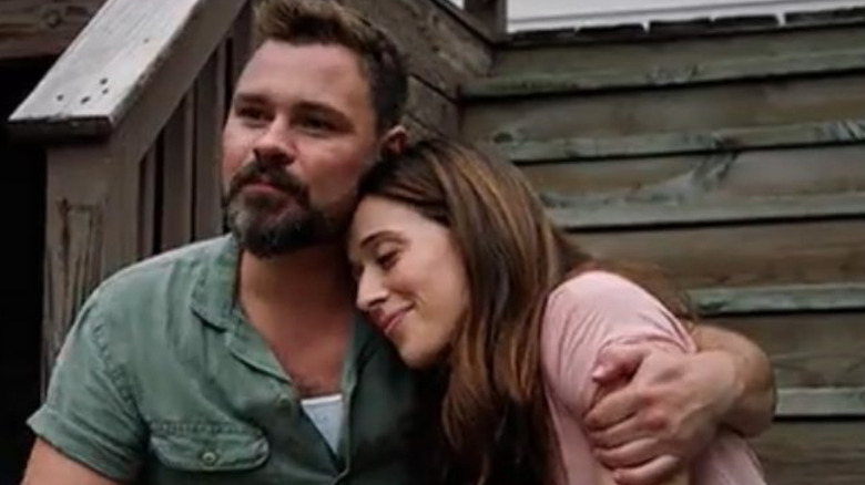 Burgess and Ruzek sitting on stairs