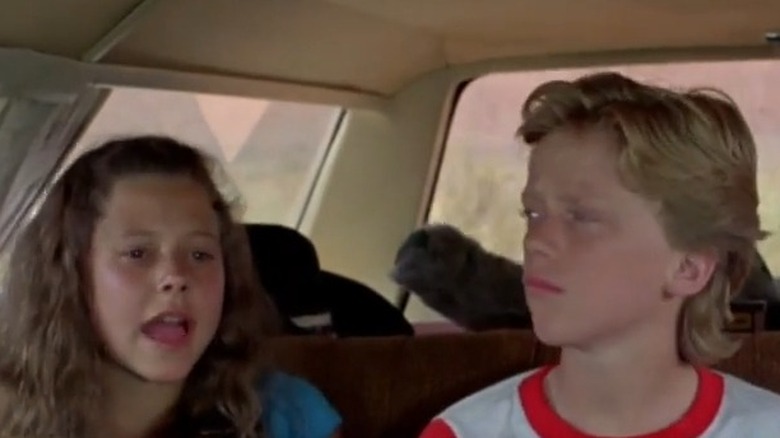 Dana Barron and Anthony Michael Hall as Audrey and Rusty Griswold