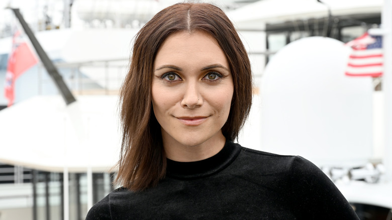 Alyson Stoner wearing black outfit