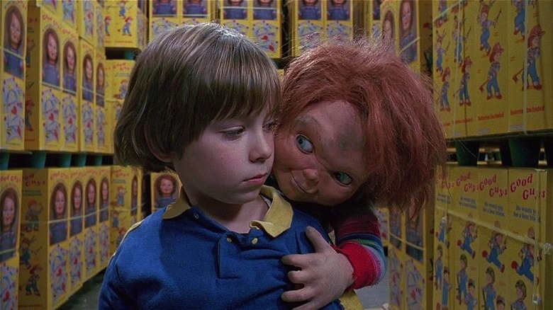 Chucky looking over Andy's shoulder