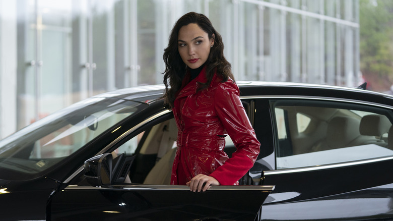 Gal Gadot entering a car in "Red Notice"