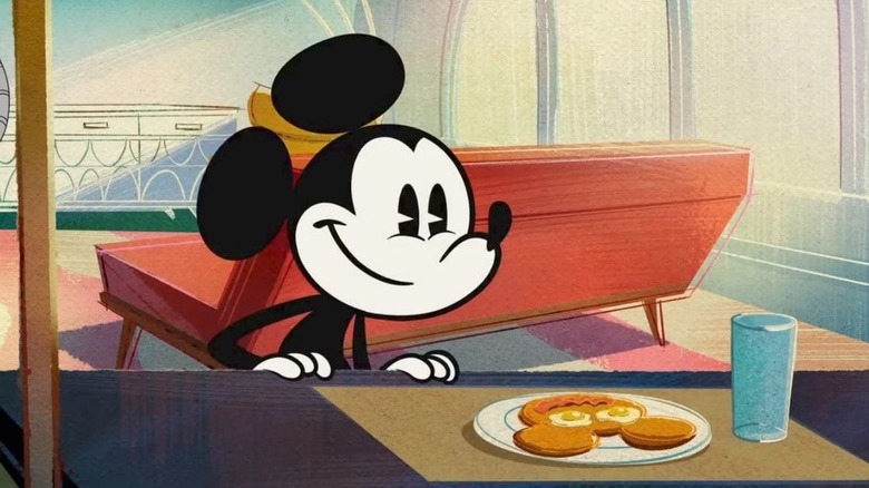 Mickey Mouse looking at a mouse-shaped pancake in "The Wonderful World of Mickey Mouse"