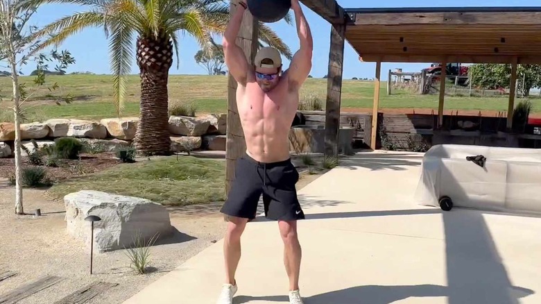 Chris Hemsworth working out shirtless