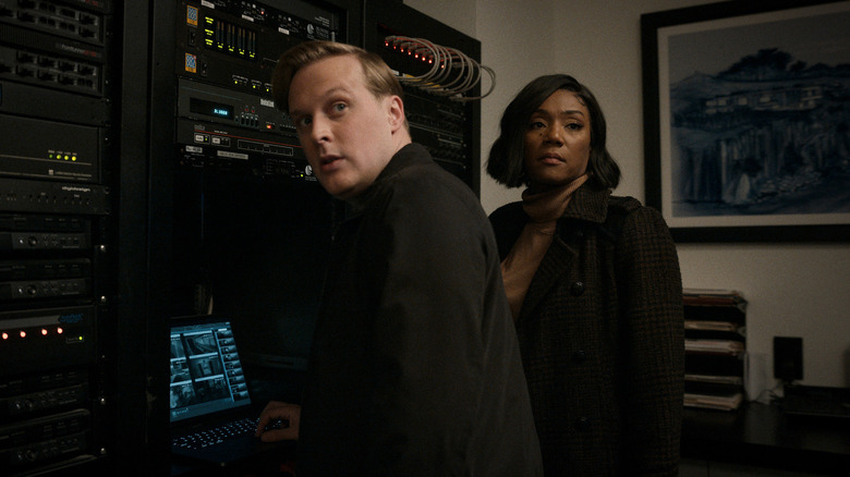 John Early and Tiffany Haddish searching for video evidence in The Afterparty
