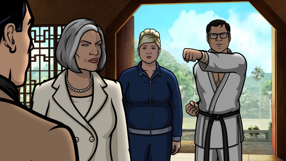 The Archer cast, including Cyril in martial arts gear