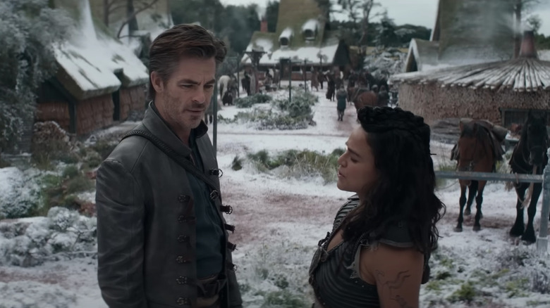 Chris Pine and Michelle Rodriguez talking outside