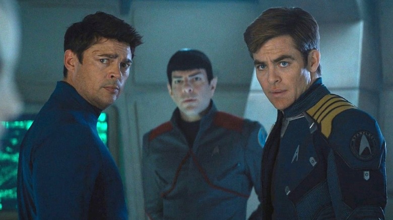 McCoy stands by Spock and Kirk