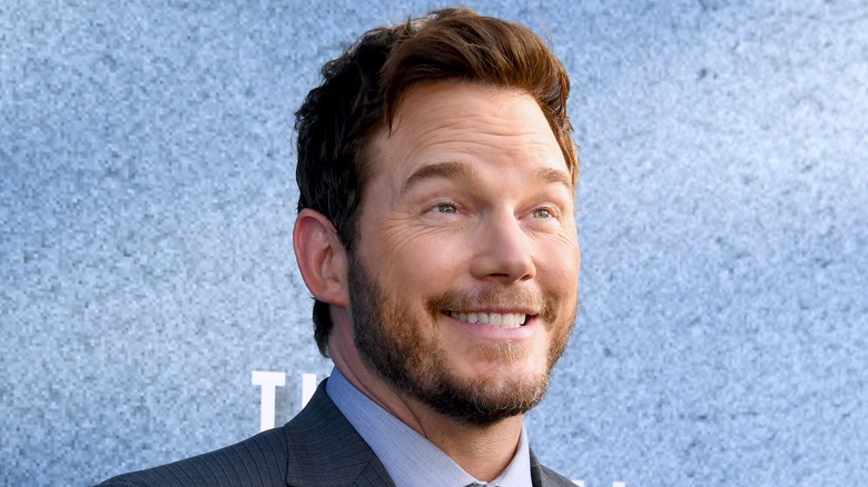 Chris Pratt smiling for photographers