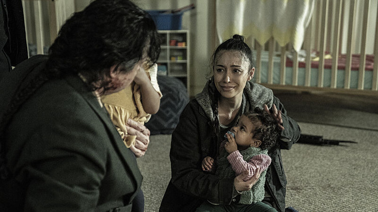 Rosita Espinosa holding a baby