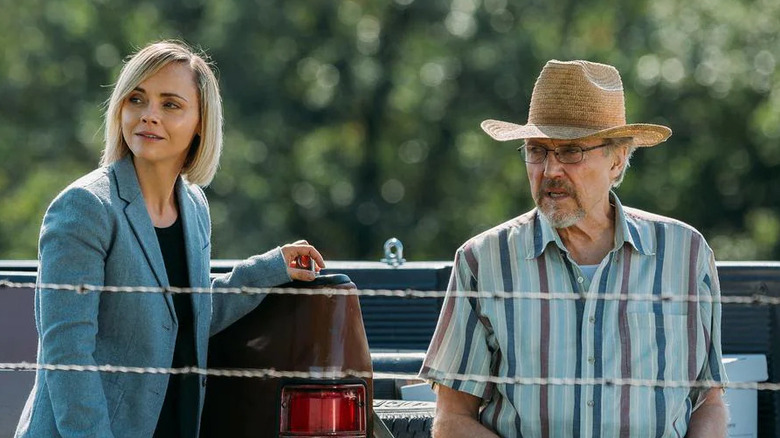 Christina Ricci and Christopher Walken looking away