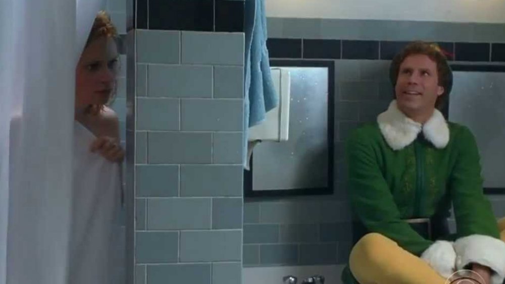 Will Ferrell as Buddy Hobbs and Zooey Deschanel as Jovie in Elf