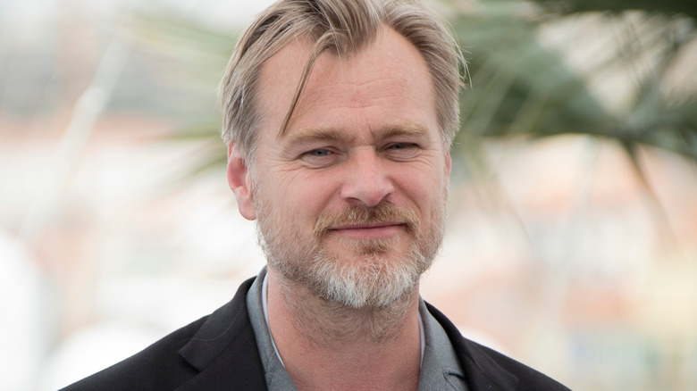 Christopher Nolan smirking