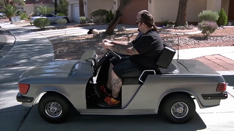 Chumlee driving Mercedes cart