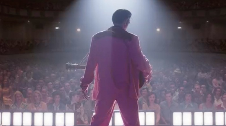 Elvis standing on stage