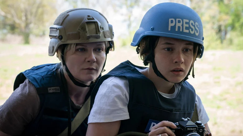 Lee and Jessie in press helmets