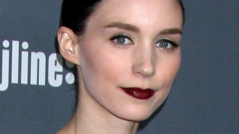 Rooney Mara smirking