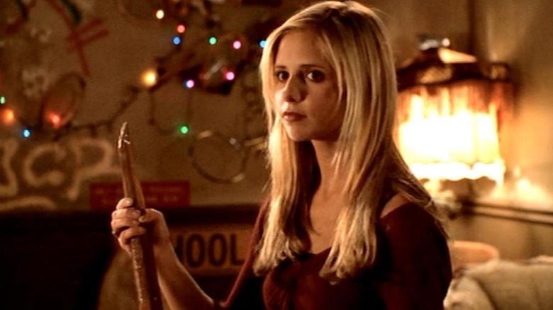 Buffy holds wooden stake