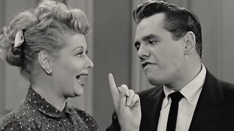 Desi Arnaz talking to Lucille Ball