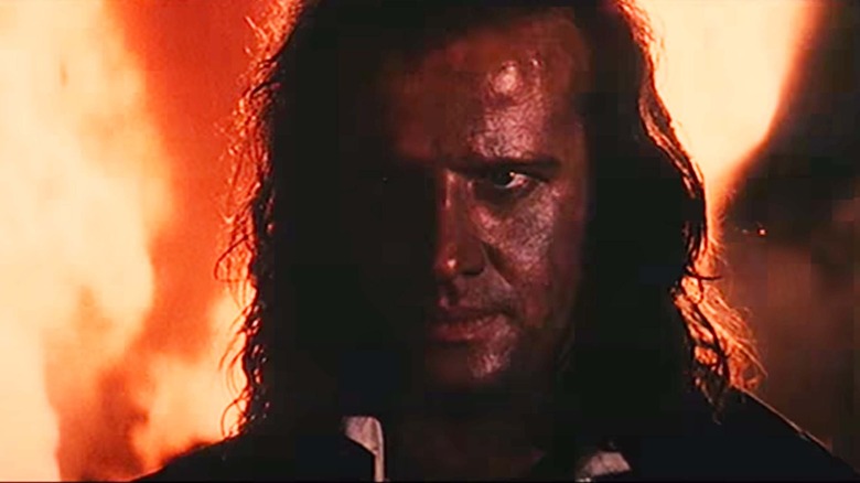 Connor MacLeod in front of flames