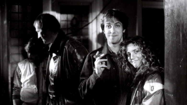 Clive Barker and Ashley Laurence smiling on the set of Hellraiser