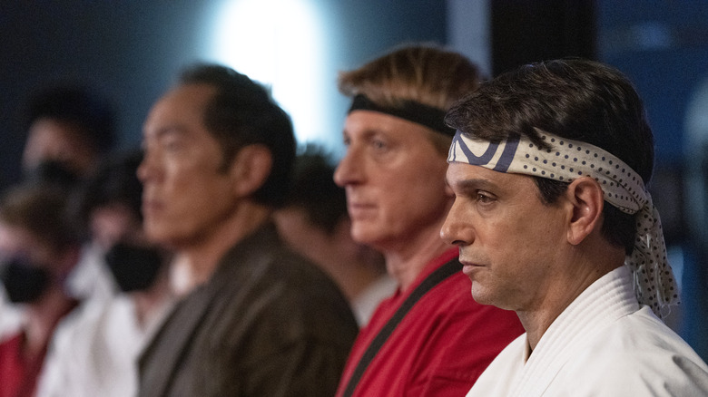 Yuji Okumoto, William Zabka, and Ralph Macchio in Cobra Kai