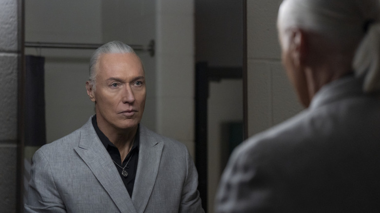 Terry Silver looking at himself in the mirror on Cobra Kai Season 6, Part 3