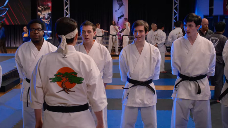 Daniel LaRusso addresses in students at a karate tournament