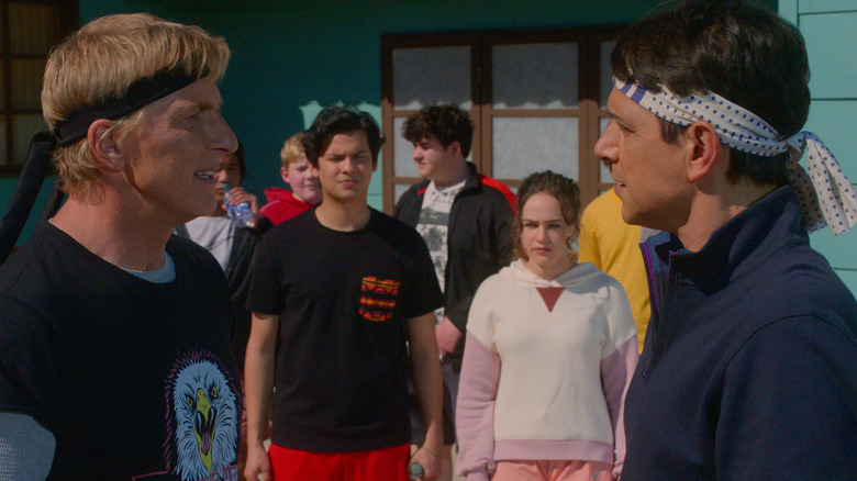 Johnny Lawrence and Daniel LaRusso facing off in Cobra Kai