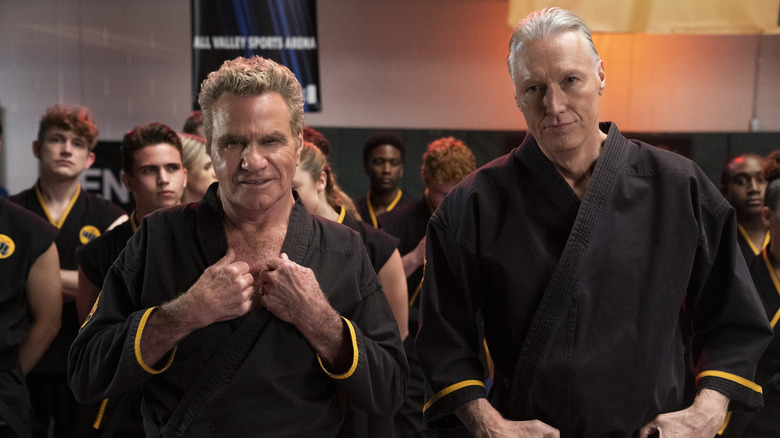 Martin Kove and Thomas Ian Griffith talking in Cobra Kai