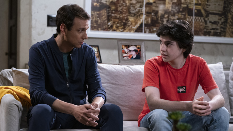 Ralph Macchio and Griffin Santopietro sitting on the couch