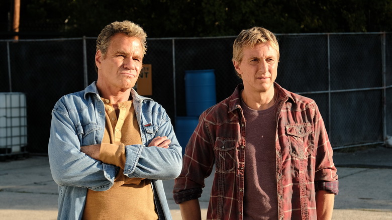 Martin Kove and William Zabka staring in Cobra Kai