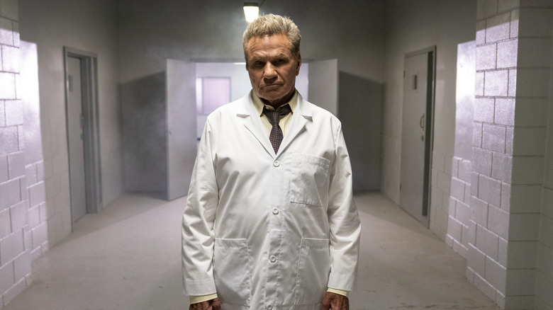 Martin Kove posing in white coat in Cobra Kai Season 5