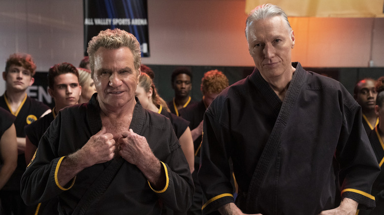 Martin Kove and Thomas Ian Griffith posing in Cobra Kai Season 4