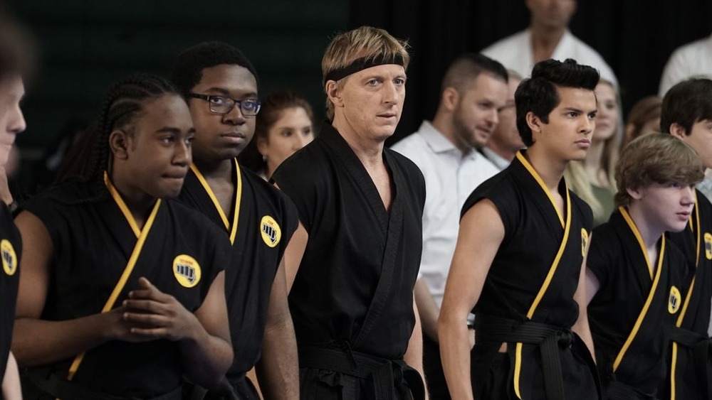 Cobra Kai watching the action at the All-Valley Karate Tournament 