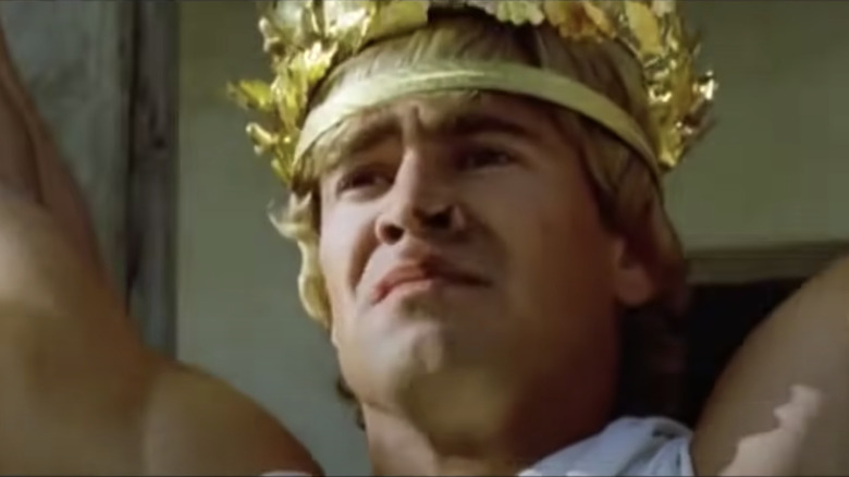 Farrell playing Alexander the Great wearing a headpiece of golden leaves