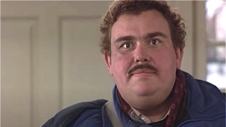 John Candy staring as Del