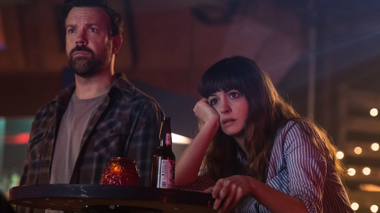 Anne Hathaway and Jason Sudeikis looking concerned