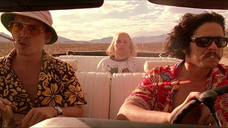 Duke and Gonzo ride with a hitchhiker in "Fear and Loathing in Las Vegas" (1998)