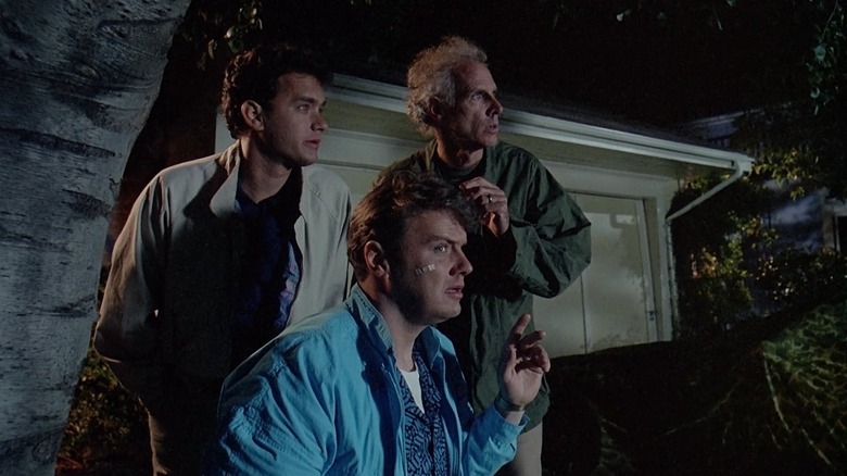 Ray and his neighbors spy on the house across the street in "The 'Burbs" (1989)