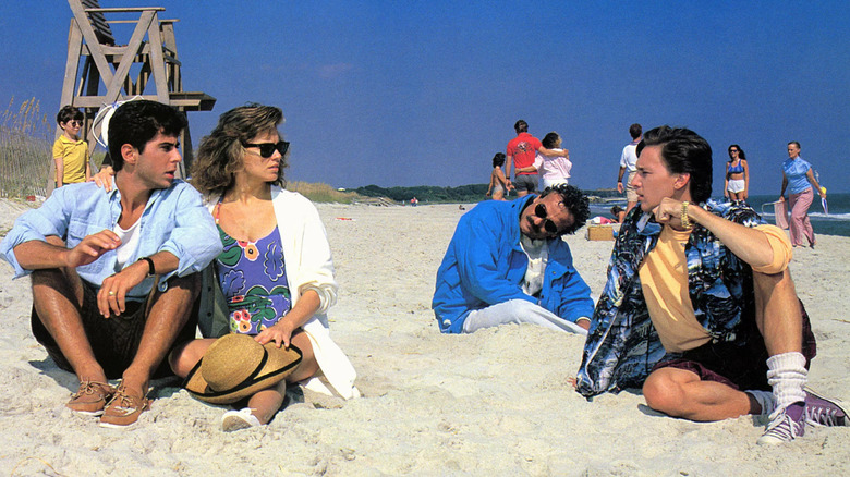 Larry, Richard, and Gwen sit with Bernie's body in "Weekend at Bernie's" (1989)