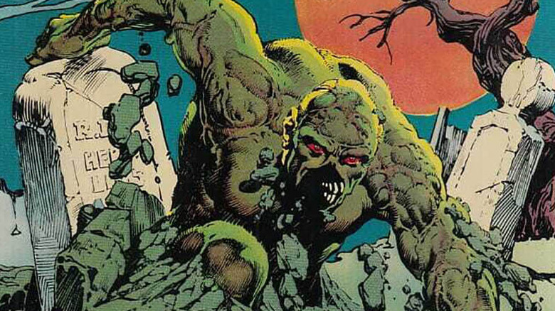 Swamp Thing rises from a grave