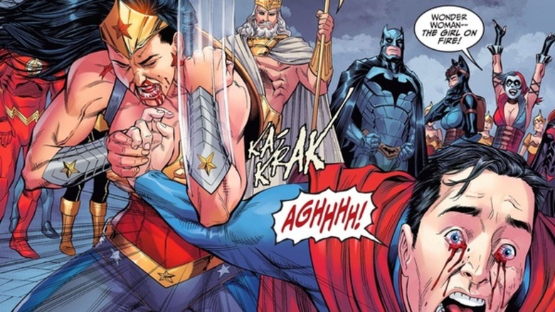 Superman's arm broken by Wonder Woman