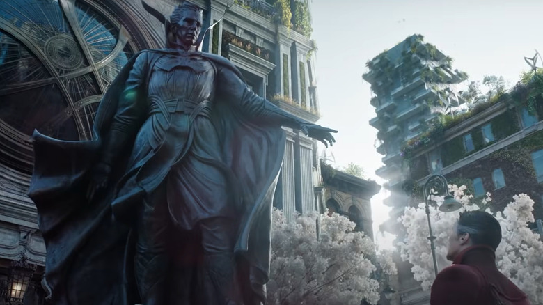 Doctor Strange looking at his statue