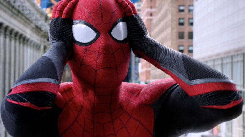 Spider-Man holding head in shock