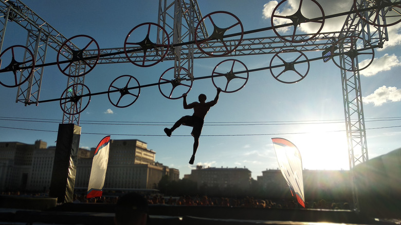 A man crossing an obstacle course