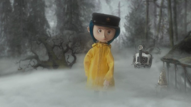 Coraline standing in fog