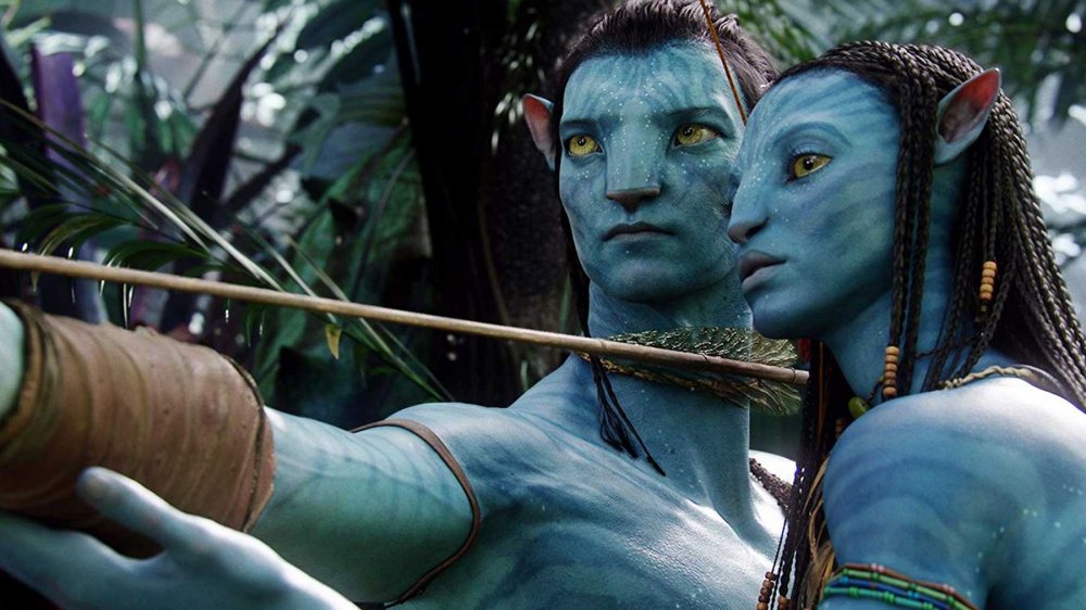 Sam Worthington as Jake Sully and Zoe Saldana as Neytiri in Avatar